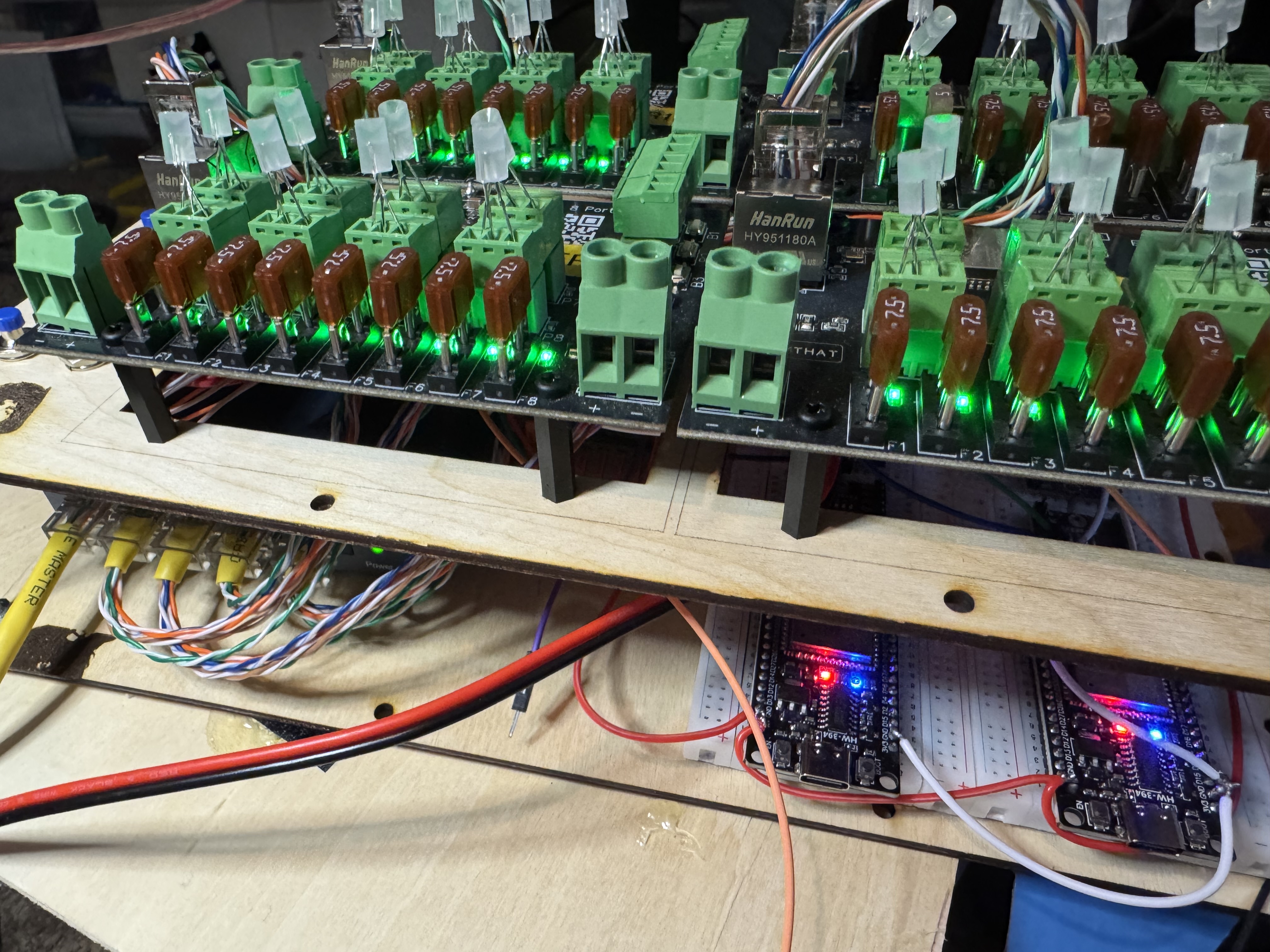 The Kluster development system showing multiple Baldrick boards mounted on wooden framework