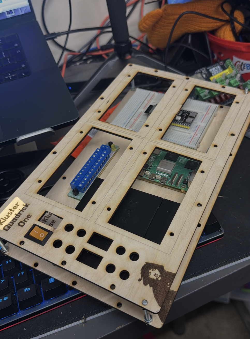Current Kluster setup showing multiple KLUSTER boards with glowing green LEDs in a grid arrangement